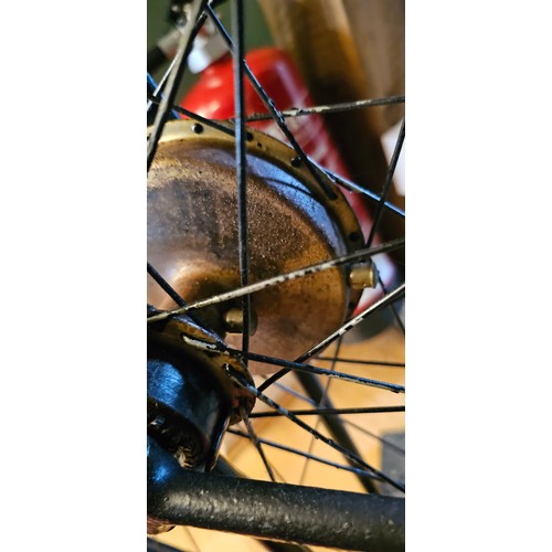 95 - An early 20th century black enamelled Penny Farthing, front wheel 33