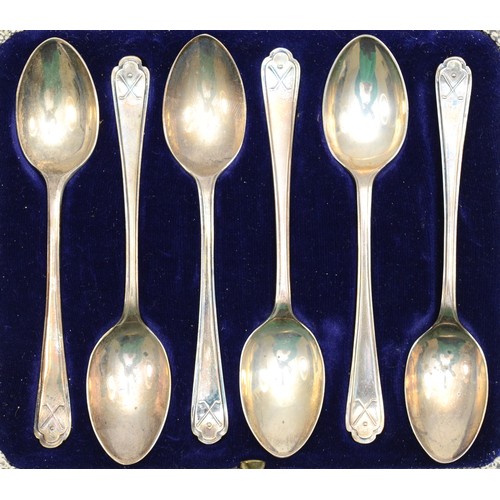16 - A George V set of six silver tea spoons, by Walker & Hall, Sheffield 1933, with golfing finials, 2.5... 