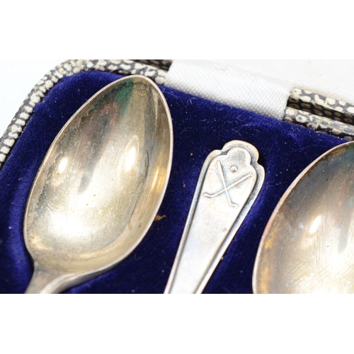 16 - A George V set of six silver tea spoons, by Walker & Hall, Sheffield 1933, with golfing finials, 2.5... 