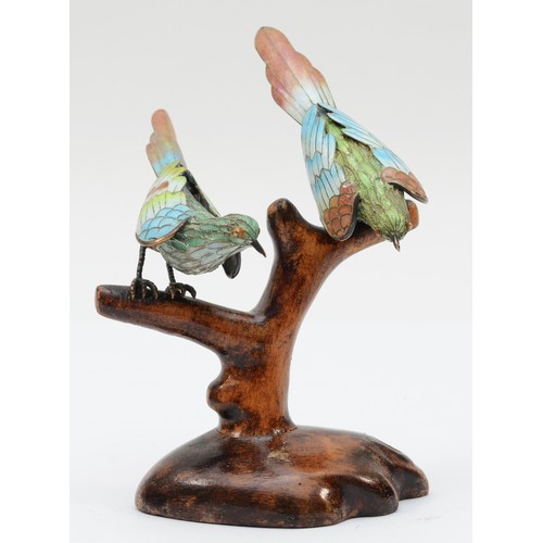 34 - A pair of 20th century Chinese silver and cloisonné enamel birds on a wooden base, stamped silver 92... 