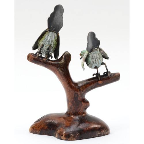 34 - A pair of 20th century Chinese silver and cloisonné enamel birds on a wooden base, stamped silver 92... 