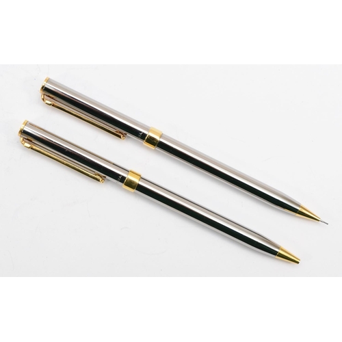 51 - Tiffany & Co, a cased matching set of pen and propelling pencil, 13cm.