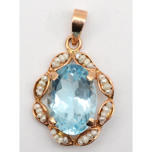 66 - A 585 gold topaz and seed pearl pendant, topaz 20 x 11mm, 2.8gm.