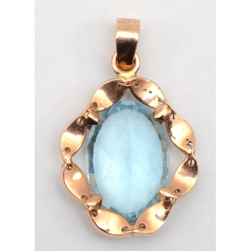 66 - A 585 gold topaz and seed pearl pendant, topaz 20 x 11mm, 2.8gm.