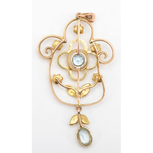 67 - An Edwardian 9ct gold aquamarine and seed pearl openwork pendant, 23 x 45mm, 2.1gm.