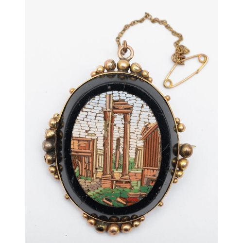 70 - A 19th century unmarked gold micromosaic brooch depicting ruins, 5 x 4 cm, 19.5gm.