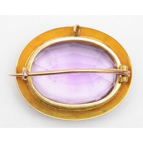 71 - A Victorian unmarked gold amethyst and seed pearl oval brooch, stone 25 x 19mm, 11.1gm.