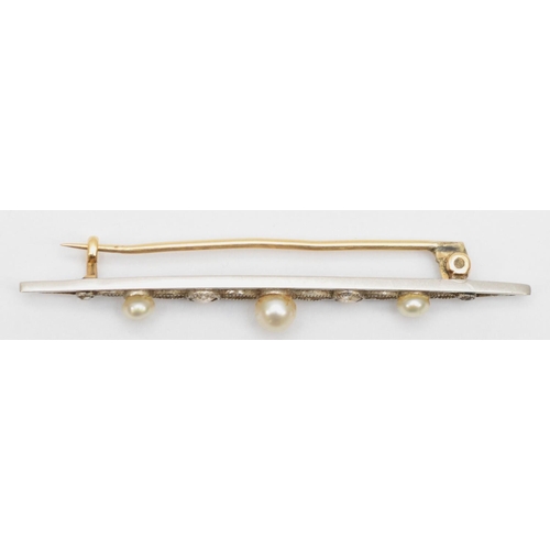 72 - An Edwardian platinum old cut diamond and pearl openwork brooch, 4.5cm, 2.7gm