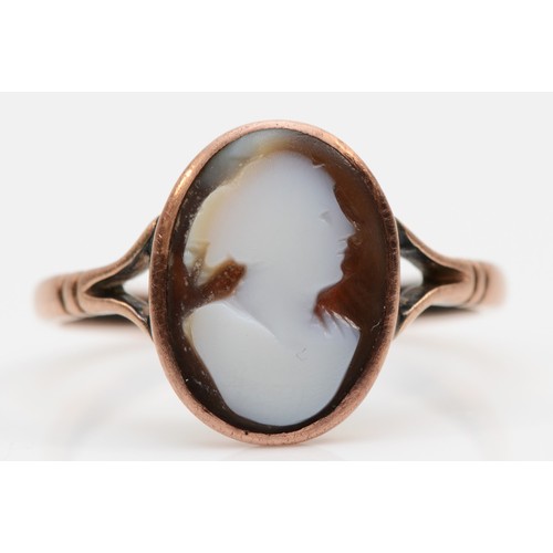 84 - A Victorian carved sardonyx cameo ring in copper mount, stamped 9ct, P - Q.