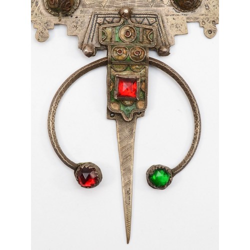 87 - A 19th century Moroccan silver and enamel Amazigh fibula, set with red and green paste stones, 23.5 ... 