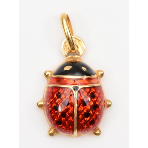 88 - A 9ct gold and enamel ladybird charm, 17mm, 1.1gm.