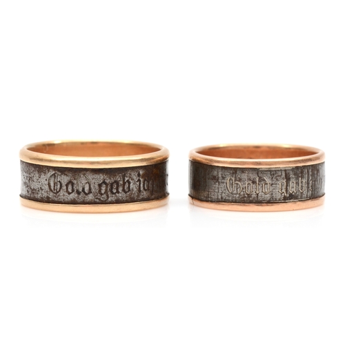 91 - Two German gold and steel wedding bands, the larger inscribed to outer band 'Gold gab ich für eisen ... 