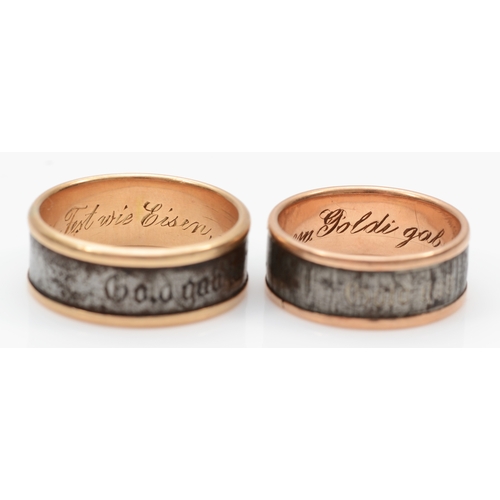 91 - Two German gold and steel wedding bands, the larger inscribed to outer band 'Gold gab ich für eisen ... 