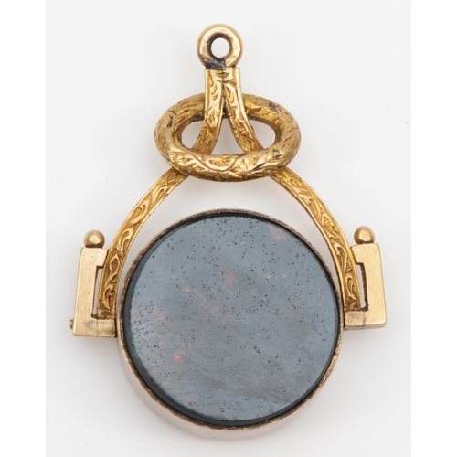 93 - A Victorian unmarked gold swivel watch fob, set with a compass and blood stone, 34 x 25mm, 8.7gm.