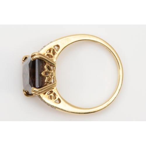 97 - A 9ct gold scissor cut smokey quartz cocktail ring, with diamonds set to the shoulders, K - L, 2.9gm... 