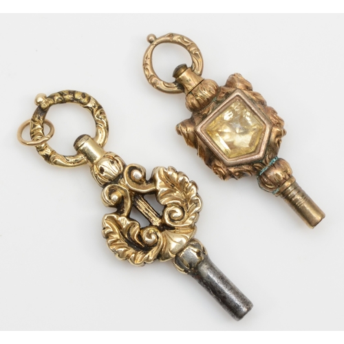 102 - Two Victorian unmarked gold cased pocket watch keys.