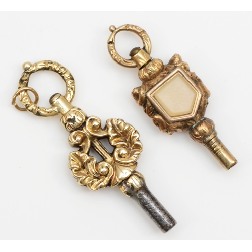 102 - Two Victorian unmarked gold cased pocket watch keys.