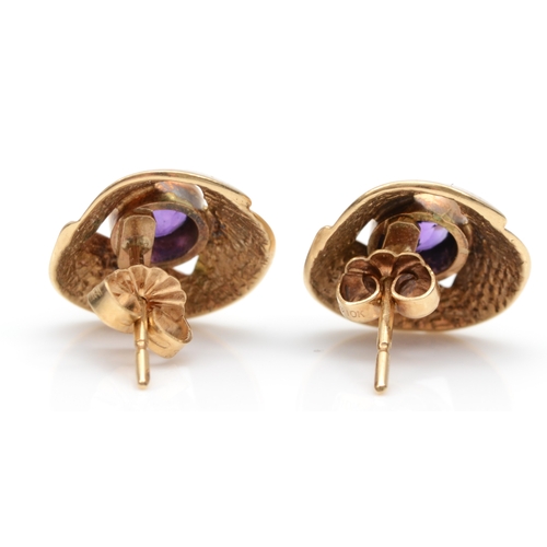 107 - A pair of 9ct gold amethyst modernist ear studs, 13mm, 3.4gm.