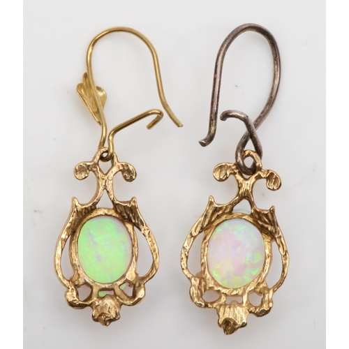 109 - A pair of unmarked gold synthetic opal drop earrings, one with replaced silver post, 17mm, 
 2.2gm.