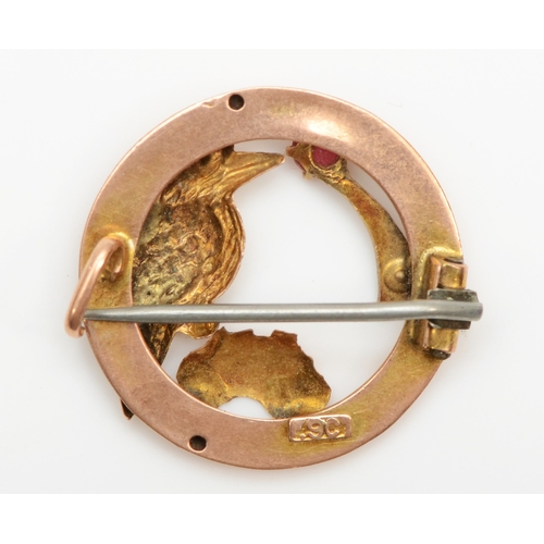 115 - A Victorian 9ct gold circular brooch, 20 mm, set with a pink paste stone, a kookaburra and Australia... 