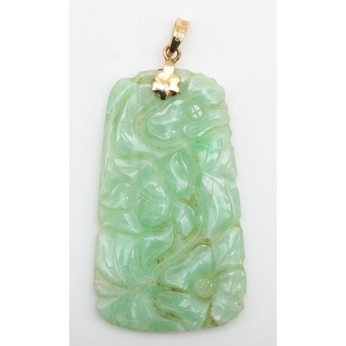 122 - A 14k gold green jadeite floral carved pendant, 46 x 21mm, 11gm.