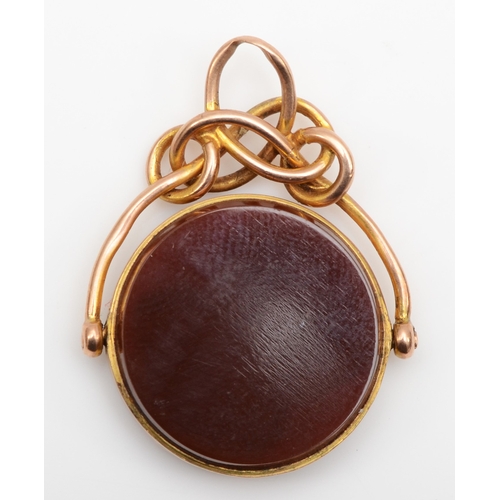 136 - A George V 9ct gold carnelian set swivel watch fob, by William John Pellow, Chester 1912, 22mm, 3.8g... 