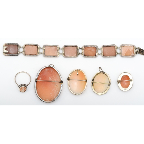 142 - A unmarked silver shell cameo bracelet, with seven carved rectangular panels depicting chariots draw... 