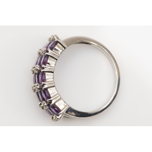 152 - A 9ct white gold amethyst and eight cut diamond cluster ring, N-O, 3.7gm.