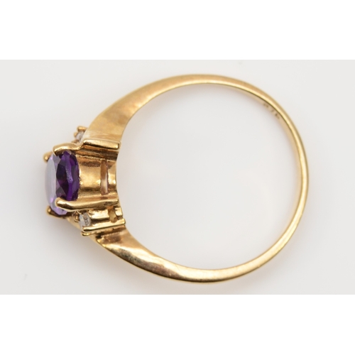 153 - A 375 gold amethyst and brilliant cut diamond dress ring, N, 3.7gm.