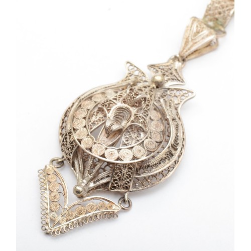 166 - A 19th century unmarked silver floral filigree pendant and collar necklace, 70mm, 66gm.