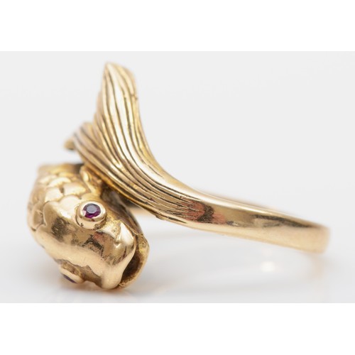 171 - A 9ct gold stylized fish ring, set with ruby eyes, L,  4.6gm.