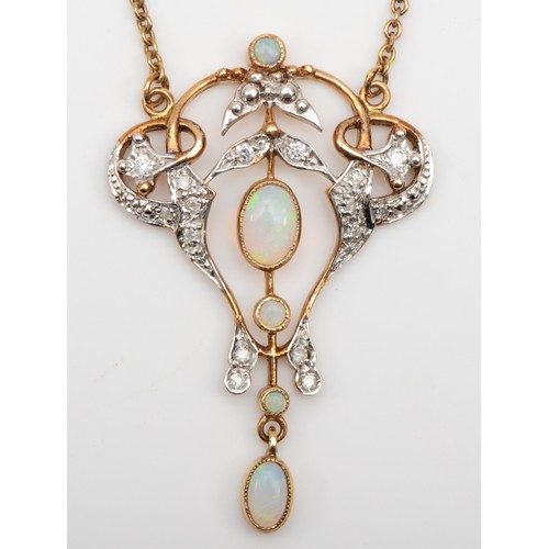 173 - A 10k gold opal and brilliant cut diamond open work pendant, 37mm, on chain 4.9gm.