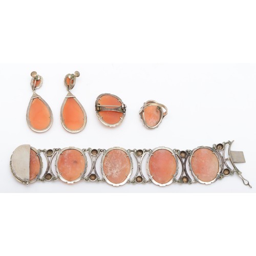 180 - A continental 800 silver suite of cameo jewellery, comprising of a ring, J, screw back drop earrings... 