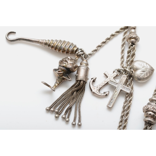 197 - An Edwardian silver albertina pocket watch chain, 28cm,  with grotesque silver charm, Birmingham 190... 