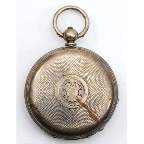 199 - A Fine Silver key wound open face pocket watch, with applied gold Roman numerals and floral border, ... 