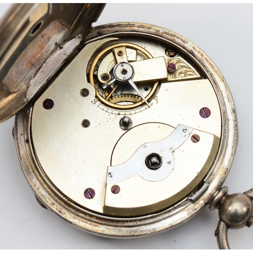 199 - A Fine Silver key wound open face pocket watch, with applied gold Roman numerals and floral border, ... 