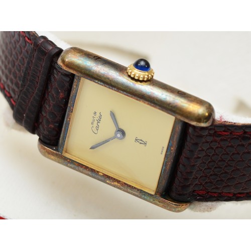 209 - Must de Cartier, a silver gilt quartz ladies wristwatch, cream dial with no numerals, the case numbe... 