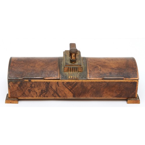 221 - Ronson, an Art Deco gilt metal walnut effect twin section dome topped table lighter, raised on squar... 