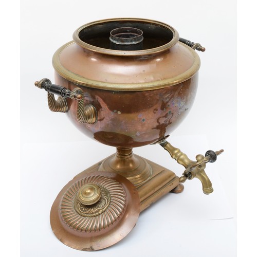 228 - A 20th century copper and brass twin handled samovar, the lid with wythern decoration, raised on ste... 