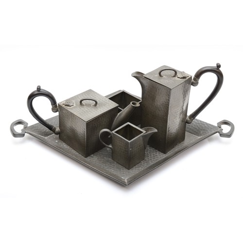 230 - An Art Deco Cubist hammered pewter tea set, by Reliable, Sheffield, comprising tea pot, hot water po... 