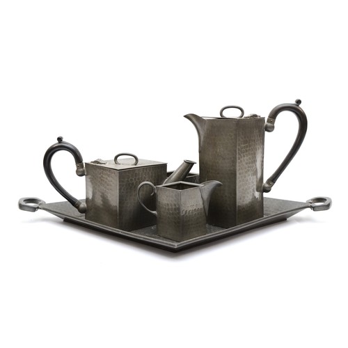 230 - An Art Deco Cubist hammered pewter tea set, by Reliable, Sheffield, comprising tea pot, hot water po... 