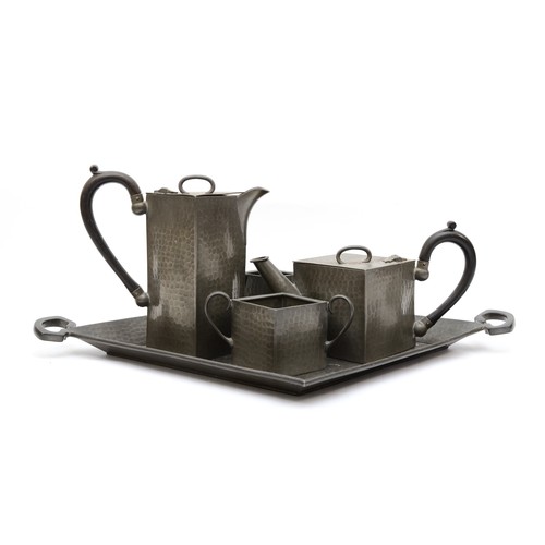 230 - An Art Deco Cubist hammered pewter tea set, by Reliable, Sheffield, comprising tea pot, hot water po... 