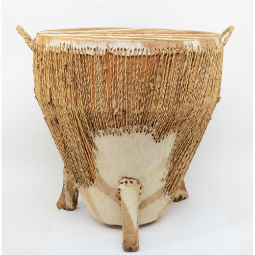 234 - A contemporary African floor standing twin handled African drum covered with leopard skin and rope, ... 