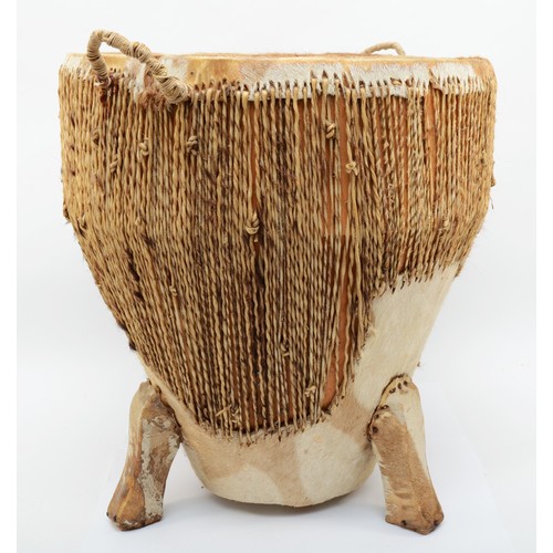 234 - A contemporary African floor standing twin handled African drum covered with leopard skin and rope, ... 