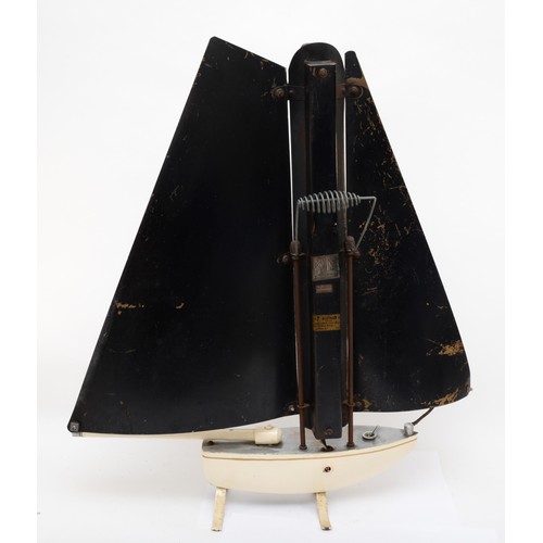 236 - A mid 20th century Yacht shaped heater (element been removed), 67x68cm.