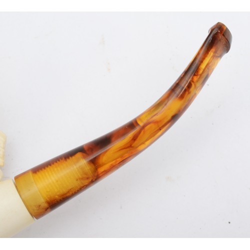 239 - Two Meerschaum style pipes, each bowl carved with the head of a bearded gentleman, 15cm long.