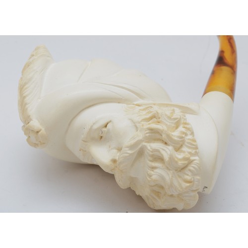 239 - Two Meerschaum style pipes, each bowl carved with the head of a bearded gentleman, 15cm long.