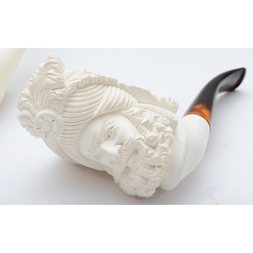 239 - Two Meerschaum style pipes, each bowl carved with the head of a bearded gentleman, 15cm long.