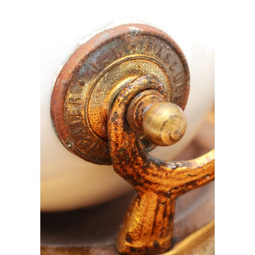 240 - An unusual French gilt and porcelain ink and pen tray, 14cm diameter.