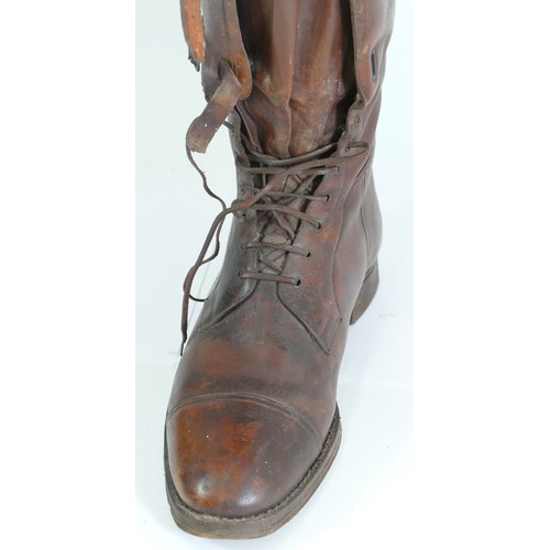 243 - A pair of 20th century brown leather riding boots, with strapwork buckles and laces, 49cm high, comp... 